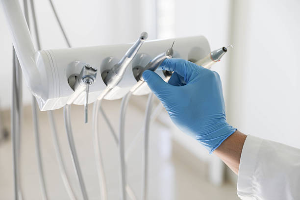 Professional Emergency Dentist technician working in Bondurant, IA